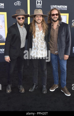 Los Angeles, California. 24Sep, 2018. Corey McCormick, Lukas Nelson e Anthony LoGerfo frequentando il 'è nata una stella' premiere presso lo Shrine Auditorium il 24 settembre 2018 a Los Angeles, California. | Utilizzo di credito in tutto il mondo: dpa/Alamy Live News Foto Stock