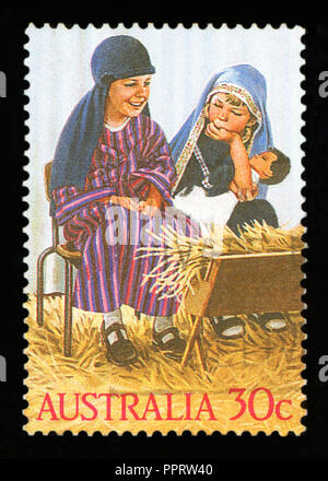 AUSTRALIA - circa 1986: un timbro stampato in Australia mostra la Santa Famiglia, Kindergarten Natività Play, Natale, circa 1986 Foto Stock