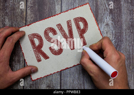 Parola di scrittura di testo RSVP. Il concetto di business per rispondere a un invito che indica se si intende partecipare. Foto Stock