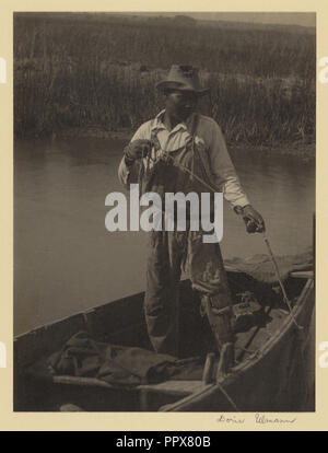 Pescatore con la gamba di legno, vicino Brookgreen Plantation, Murrells Inlet, Carolina del Sud; Doris Ullmann, americano, 1882 - 1934 Foto Stock