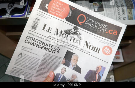 MONTREAL, Canada - 14 settembre 2018: Le Mouton Noir giornale in una mano Foto Stock