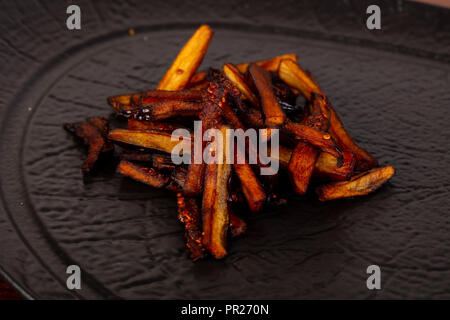 Melanzane Arrosto heap snak topping Foto Stock