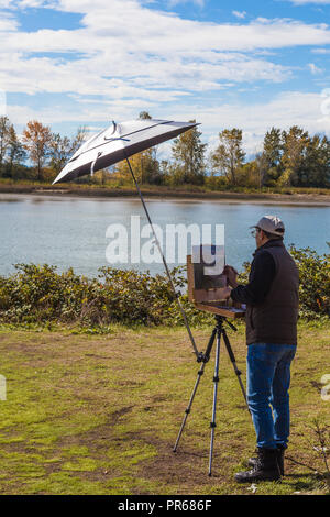 Un artista che partecipano ad un ART Grand Prix in Steveston, British Columbia Foto Stock