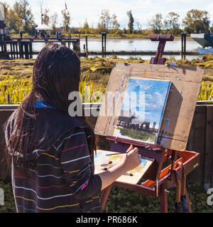 Un artista che partecipano ad un ART Grand Prix in Steveston, British Columbia Foto Stock