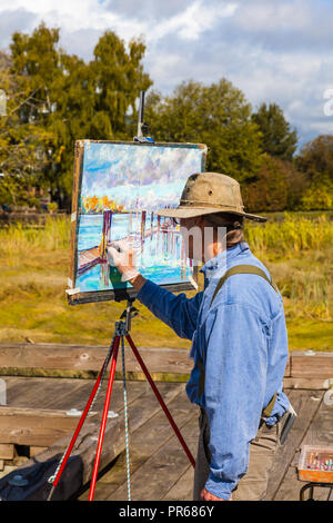 Un artista che partecipano ad un ART Grand Prix in Steveston, British Columbia Foto Stock