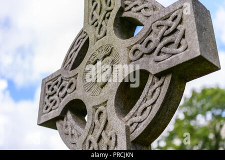 Medico saggiamente la croce alla Giordania appezzamento di famiglia, frate boccola del cimitero di Belfast. Foto Stock