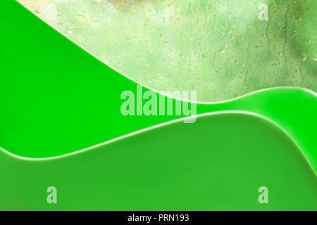 Abstract linee curve di verde coppa in plastica Foto Stock