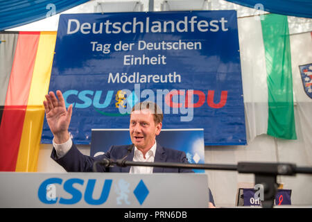 Moedlareuth, Turingia. 03 ott 2018. Michael Kretschmer (CDU), il primo ministro del Land di Sassonia, parla in un rettangolo di selezione su unità tedesca giorno. La CSU e CDU associazioni dalla Turingia e Sassonia si celebra il festival tedesco nel villaggio di Mödlareuth, precedentemente divisi dal confine interno-tedesco. Credito: Arifoto ug/Michael Reichel/dpa-Zentralbild/dpa/Alamy Live News Foto Stock