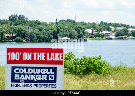 Florida,Lago Placid,Lago giugno-in-Inverno,segno,Waterfront Land lot sale,FL180731246 Foto Stock