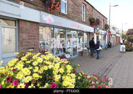 Negozi di High Street in Alness, Ross and Cromarty, Scotland, Regno Unito Foto Stock