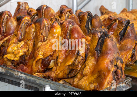 Hornados o arrosto di maiale San Giovanni di Sangolqui mercato alimentare, Ecuador, Foto Stock