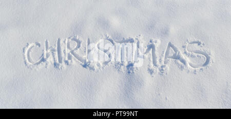 Panorama parola Natale impronta sulla pura frosty foto della neve Foto Stock