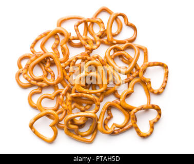 A forma di cuore ad pretzel isolati su sfondo bianco. Foto Stock