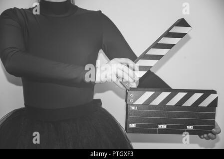 Clapboard in mano Foto Stock