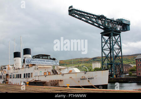 Il TS Queen Mary visto qui a Greenock, è uno dei più antichi Clyde costruito piroscafi nel mondo. Ella è stata salvata dal scrapyard, e ora siede ulteriormente fino al fiume Clyde vicino a Glasgow in attesa di restauri e riparazioni. Una carità è stato impostato per fare questo, sostenuto dall'attore scozzese, Robbie Coltrane. Esso sarà permanentemente ormeggiato sul fiume Clyde e usato come una istruzione e un centro di intrattenimento. Una grande nave ritorna alla Clyde, la casa della sua nascita tutti questi anni fa nel 1933. Data; 2018. Foto Stock