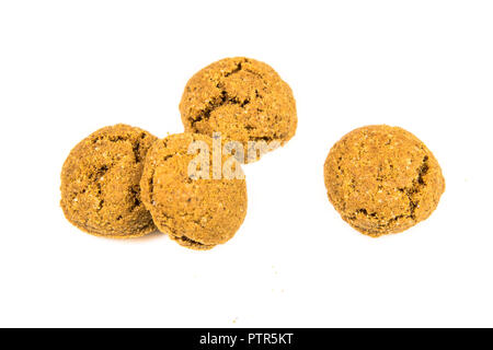 Set di quattro pepernoten i cookie dal di sopra su sfondo bianco per Sinterklaas annuale evento di vacanza nei Paesi Bassi il 5 dicembre Foto Stock