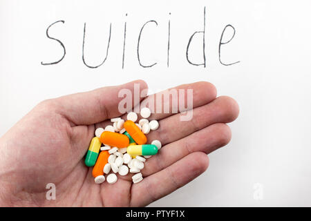 Iscrizione al suicidio di una manciata di pillole Foto Stock