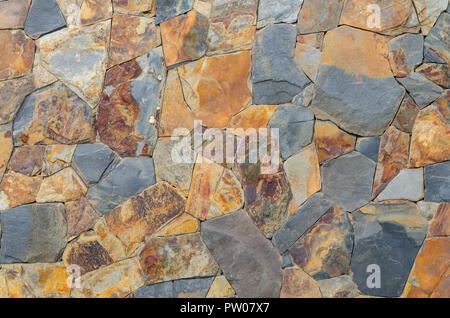 Muro di pietra texture costruire da lastre in pietra Foto Stock