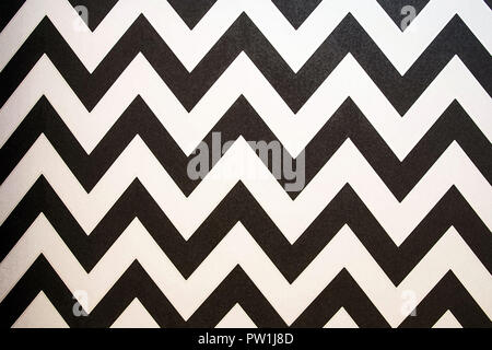 Strisce a zig-zag pattern seamless sfondo. In stile retrò. Modello per la carta da parati, imballaggio, materiale tessile, tessuto. Texture di sfondo in bianco e nero Foto Stock