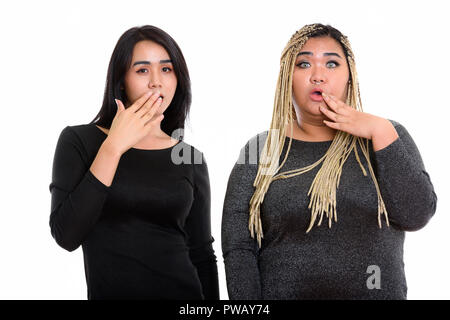 Giovani asiatici transgender donna e grasso donna asiatica cercando shocke Foto Stock