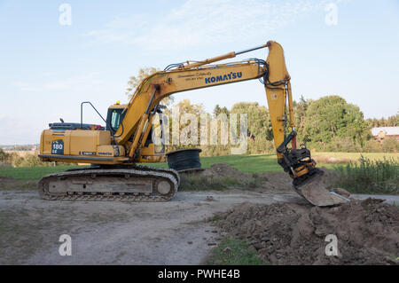 Scavo sotterraneo di posa dei cavi elettrici Foto Stock