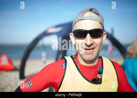 Ritratto di una pagaia boarder dopo una gara Foto Stock