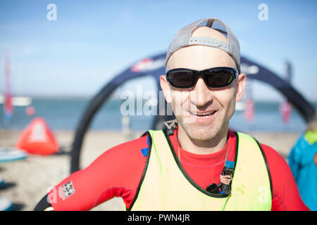 Ritratto di una pagaia boarder dopo una gara Foto Stock