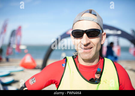 Ritratto di una pagaia boarder dopo una gara Foto Stock