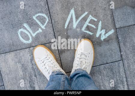 Il testo su asfalto vecchio e nuovo, una scelta Foto Stock