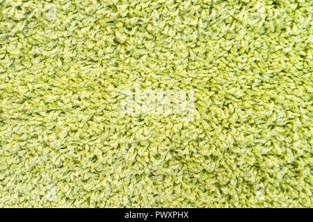 Prato verde per sfondo.erba verde dello sfondo. texture. vista superiore Foto Stock