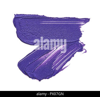 ?Urple trucco cospargere di lip gloss sfondo. Rotto crema viola rossetto sfondo texture Foto Stock