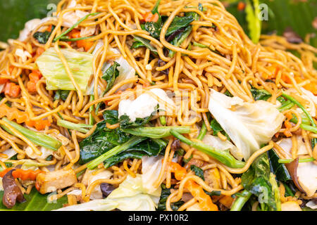 Agitare vegetale di riso fritto a base di noodle. Streed cibo in Bangkok China town di Foto Stock