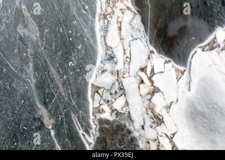 Uno sfondo di peeling la vernice e la ruggine antica pietra, macro shot. Foto Stock