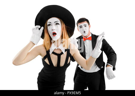 Mime femmina applicazione di mascara immaginario Foto Stock