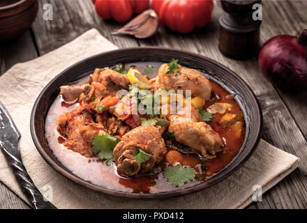 Rustico stufato di pollo Foto Stock