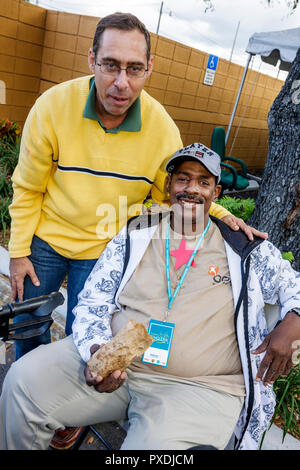 Miami Florida,Association for Development of Exceptional,ADE,MLK Day Carnival,develmentally disabled,mental,mental,fisicamente,physical,chair, Foto Stock