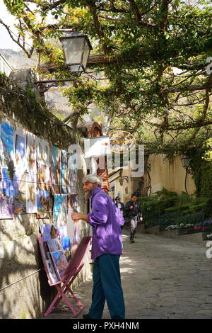 Artista di strada a Positano, cliffside villaggio sull'Italia meridionale della Costiera Amalfitana Foto Stock