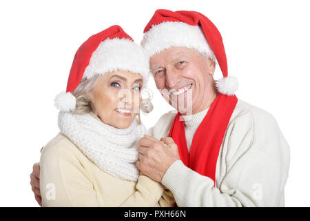 Ritratto di coppia senior in cappelli di Babbo Natale Foto Stock