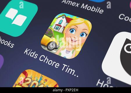 London, Regno Unito - 23 Ottobre 2018: Close-up del Kids Chore Time - Giochi di Ragazze alla Moda Per ragazze ragazzi icona da Ninjafish Studios su un iPhone. Foto Stock