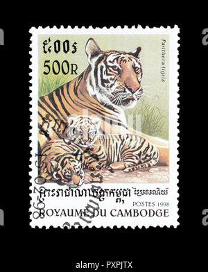 Annullato francobollo stampato dalla Cambogia, che mostra Tiger, circa 1998. Foto Stock
