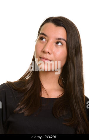 Giovane bella donna caucasica pensando e guardando in alto Foto Stock