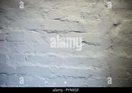 Grigio a trama irregolare di parete di mattoni texture di sfondo. Foto Stock