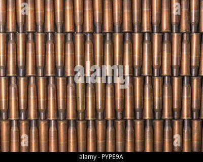 La texture fatte di ottone antico bullet gusci disposti in linee Foto Stock