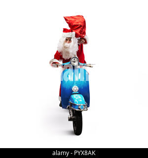 Babbo Natale con sacchetto rosso di presenta su un motociclo per offrire presenta Foto Stock