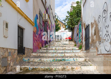 Street Art Graffiti in area povera di Malaga Spagna Foto Stock