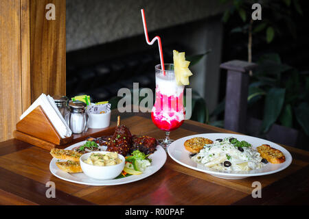 Milk Shake e pollo lecca-lecca Foto Stock