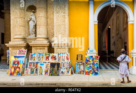 Arte in vendita al di fuori della cattedrale di Cartagena, Cartagena de Indias, Colombia, Sud America Foto Stock