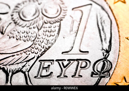 Greco 1 Euro moneta su un 10 Euro nota Foto Stock