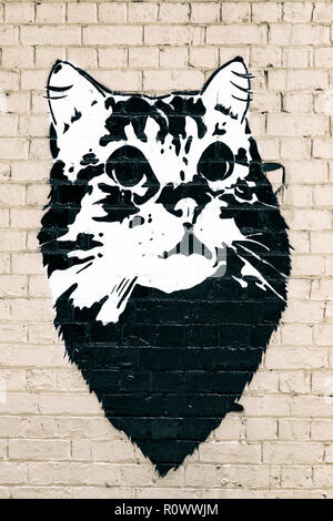 Gatto graffiti su un muro di mattoni, Melbourne Foto Stock