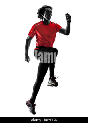 Un uomo caucasico pratcticing runner acceso del jogging jogging in studio silhouette isolati su sfondo bianco Foto Stock